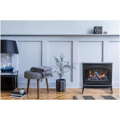 Amantii Cast-Iron Freestanding Fireplace placed seamlessly at  a modern living room setup