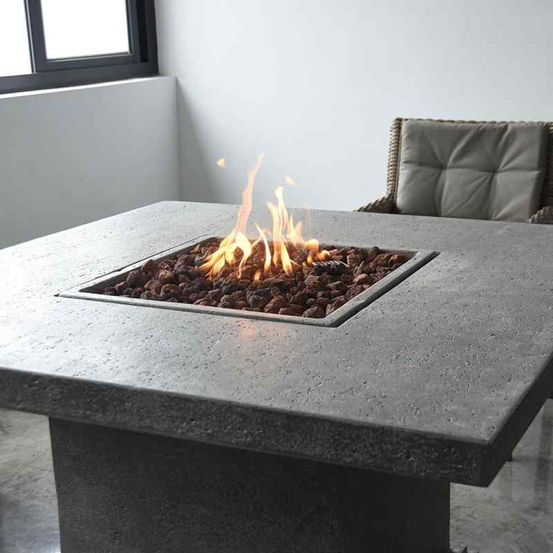 Elementi Birmingham Dining Table in gray showcasing its flames and rocks