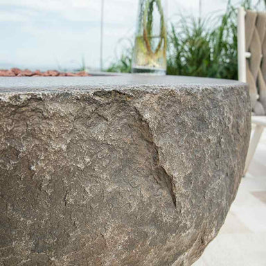 Elementi Boulder Fire Table in natural color showcasing its beautiful texture close up