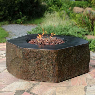 Elementi Columbia Fire Table in Neutral showcasing its flames and lava rocks