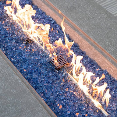 Elementi Plus Positano & Riviera Rectangular Concrete Fire Table in light grey with fire glass and showing its flames
