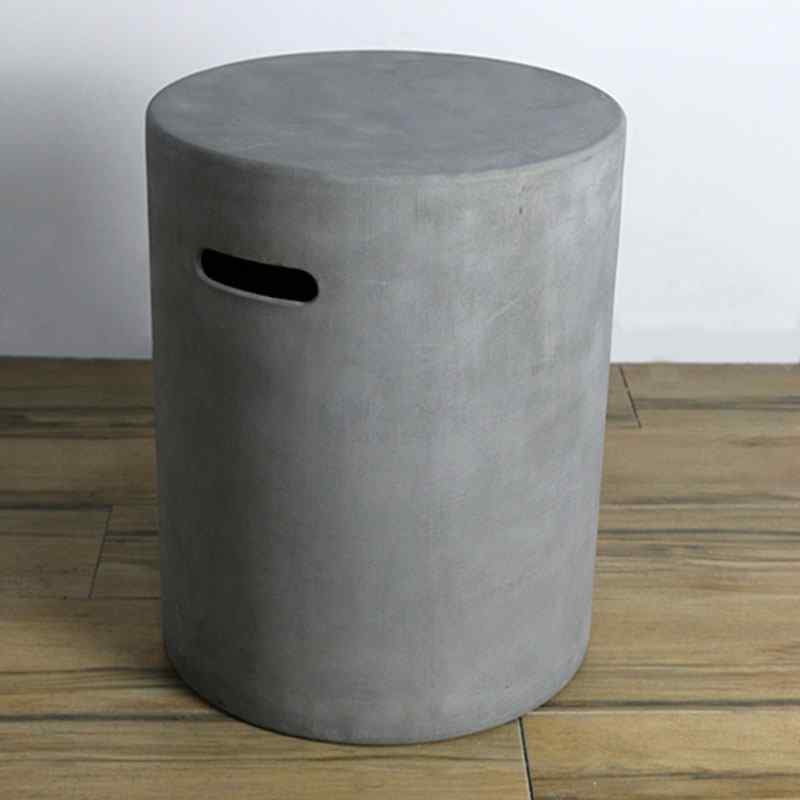 Elementi Round Tank Cover Smooth Finish in Light Grey placed indoors