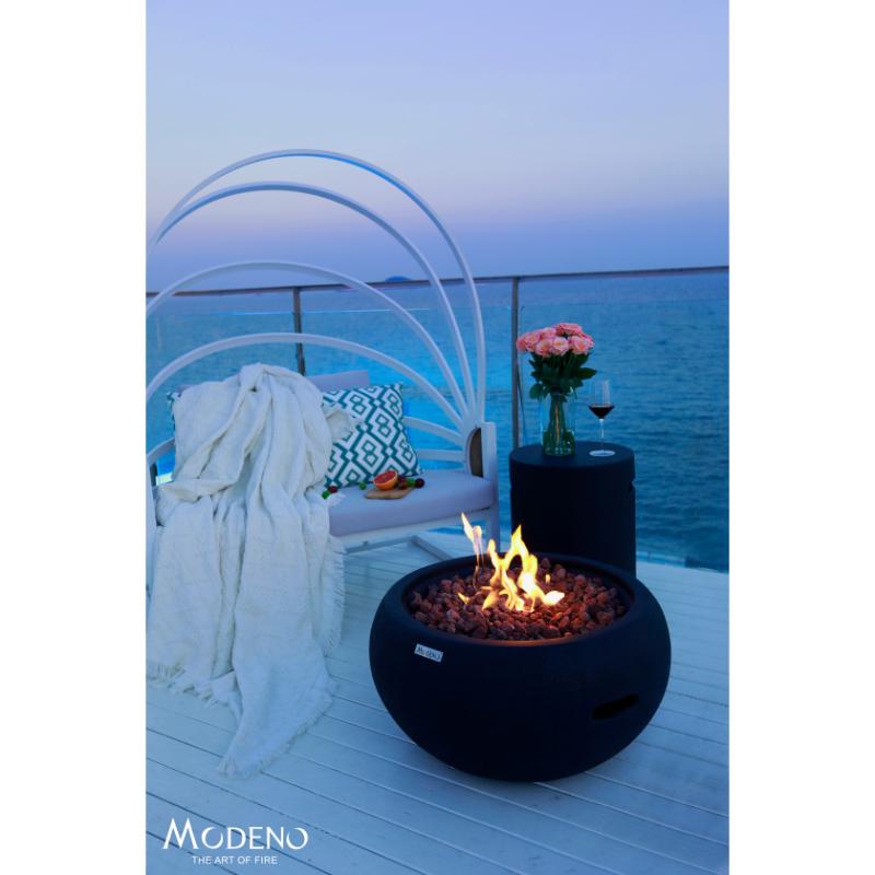 Modeno York Fire Bowl in Black is Placed near the sea