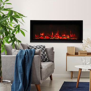Remii WM Smart Electric Fireplace with oak log set in cozy living room