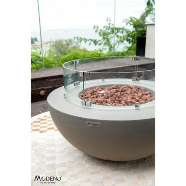 Roca Fire Pit by Modeno in light grey with the optional windscreen for protection