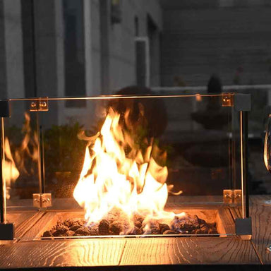 Showcasing the flames of the Rova Bar Table by Elementi
