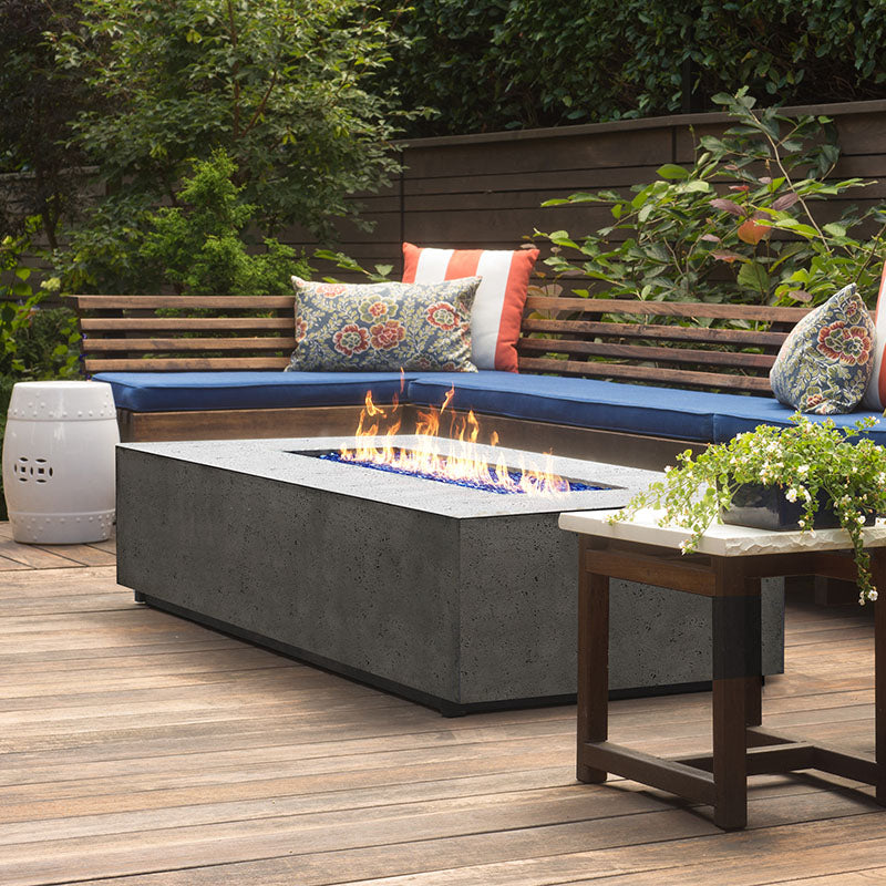 the Tavola 1 Concrete Fire Pit placed outside for a more inviting space