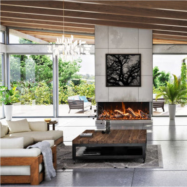 The Amantii Tru View Bespoke 3-Sided Electric Fireplace is placed in the living room as a centerpiece