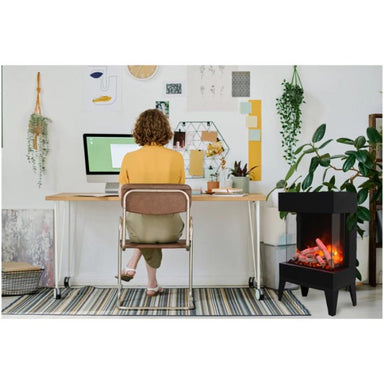 The Cube Freestanding Smart Electric Fireplace beside the Lady Working