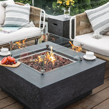 The Dark Grey of The Elementi Manhattan Fire Table placed on the outdoor space