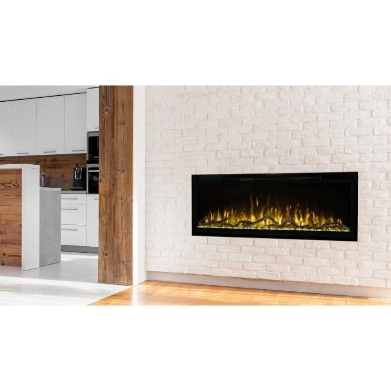 The Spectrum Slimline Electric Fireplace is placed in a white brick wall