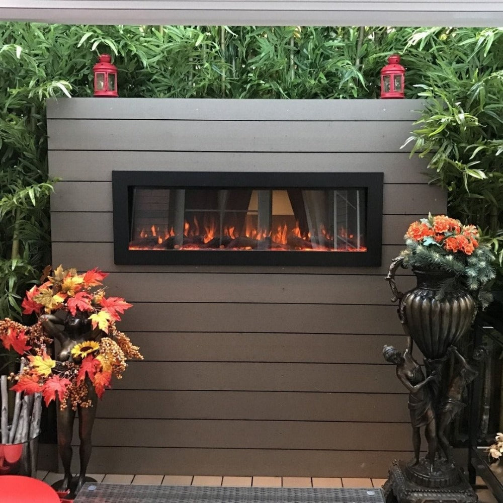 Touchstone Sideline 50 Inch Outdoor Electric Fireplace installed in outdoor patio